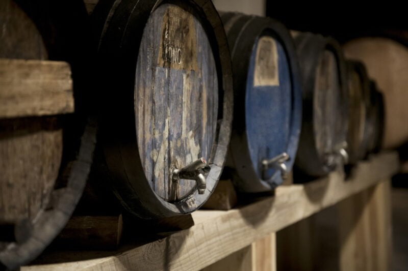 wine cellar with old wine barrels arrangement