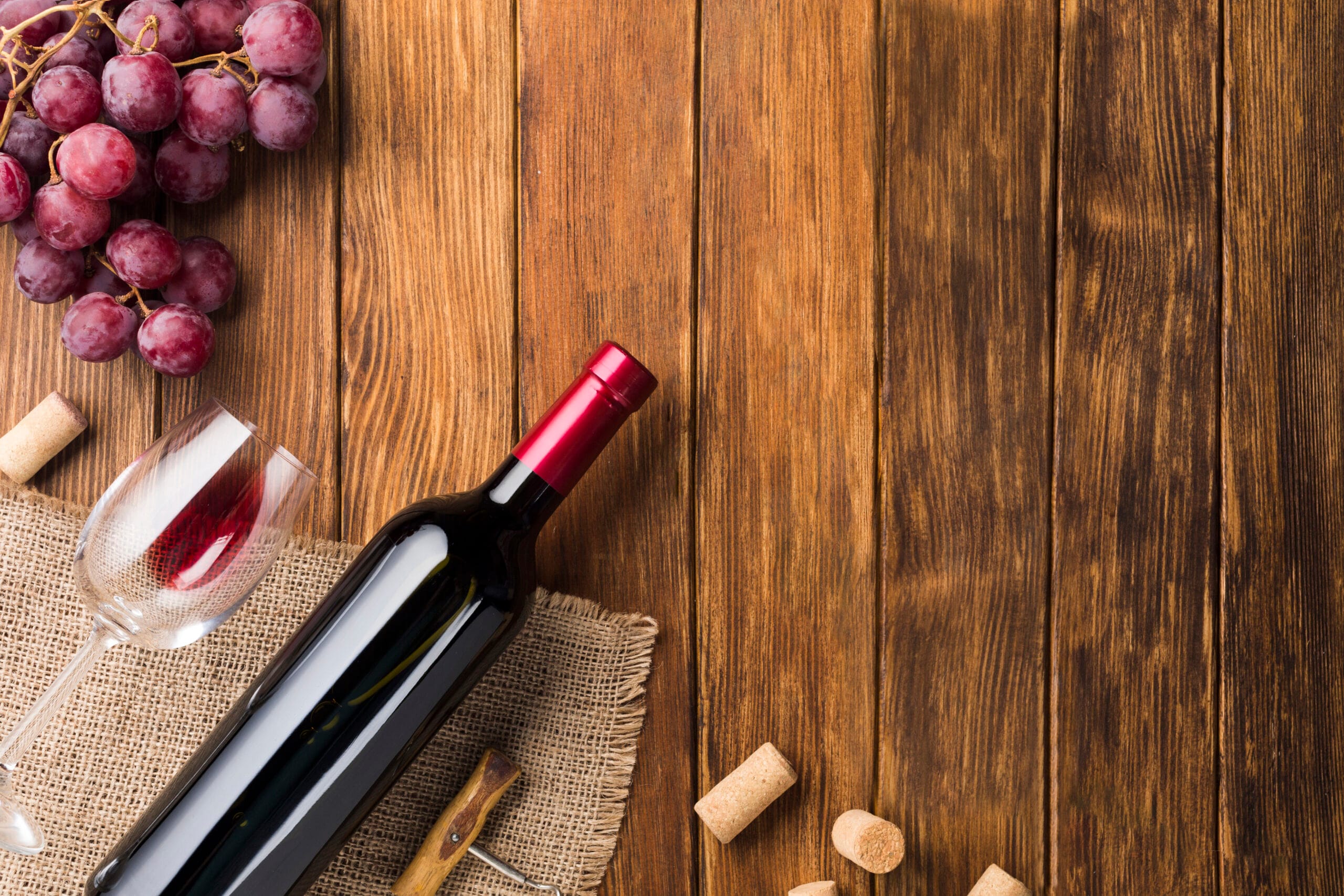 red wine bottle grapes